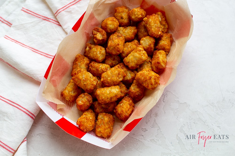 air fried tater tots in a paper basket