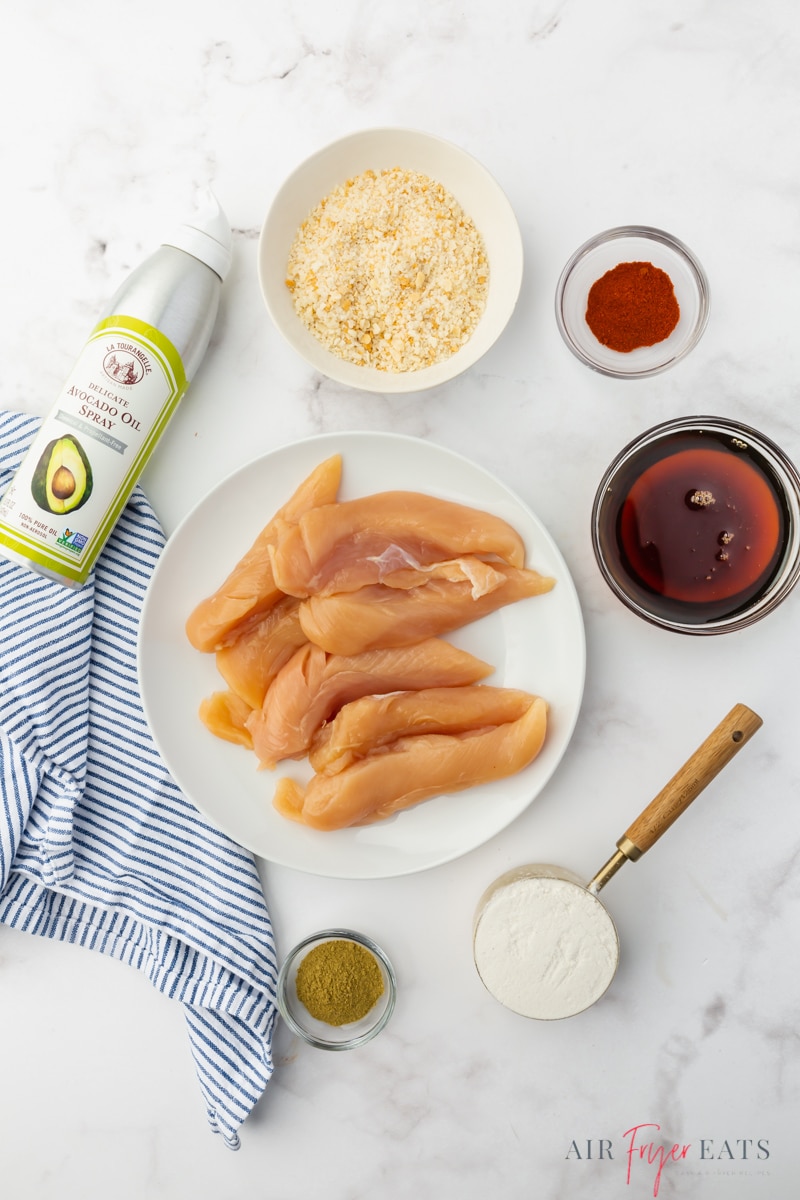 The ingredients for making homemade chicken tenders in the air fryer