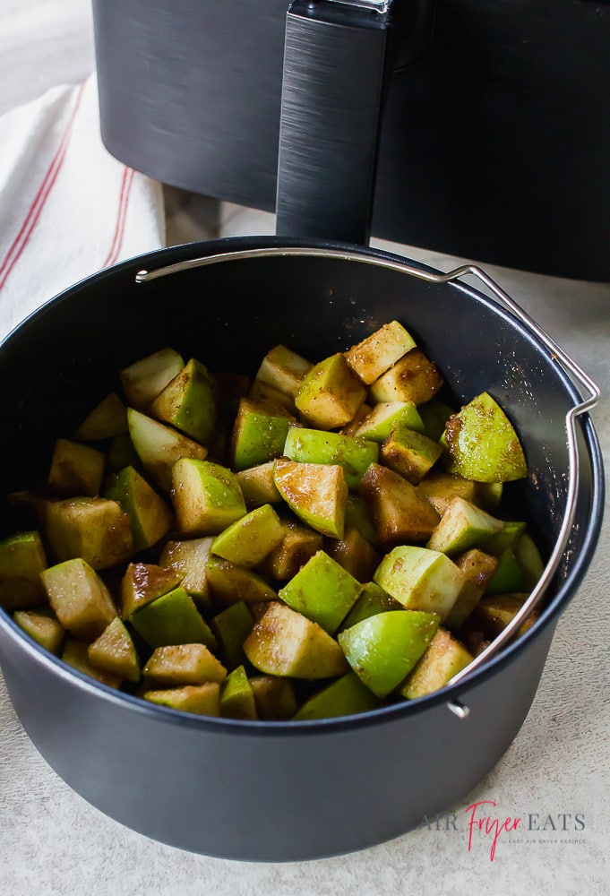 cooked Granny Smith apples covered in seasonings and sugar