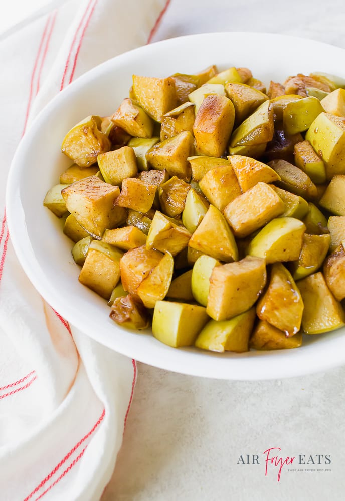 cooked Granny Smith apples covered in seasonings and sugar