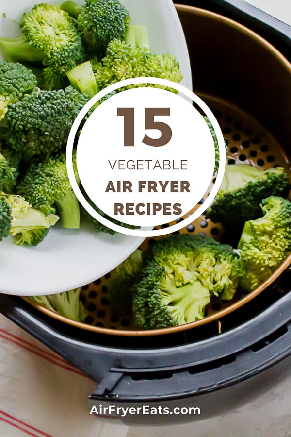 broccoli being poured from a white bowl into an air fryer basket. Text over lay of a white circle. Text in circle is brown font and says 15 vegetable air fryer recipes