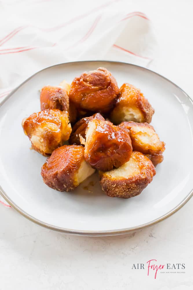 Pieces of monkey bread on a white plate