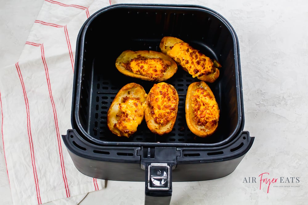 TGIFridays potato skins in a black air fryer basket