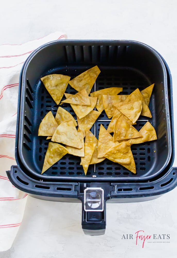 air fryer tortilla chips in black air fryer basket