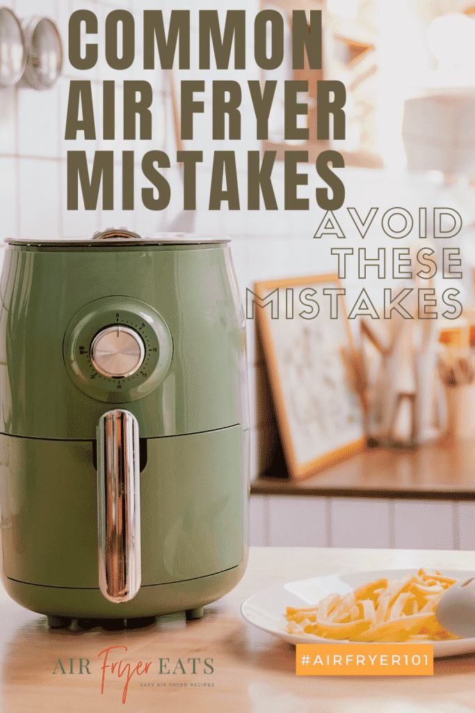 picture of a white and bright kitchen with a green air fryer. Words that say common air fryer mistakes, avoid these mistakes
