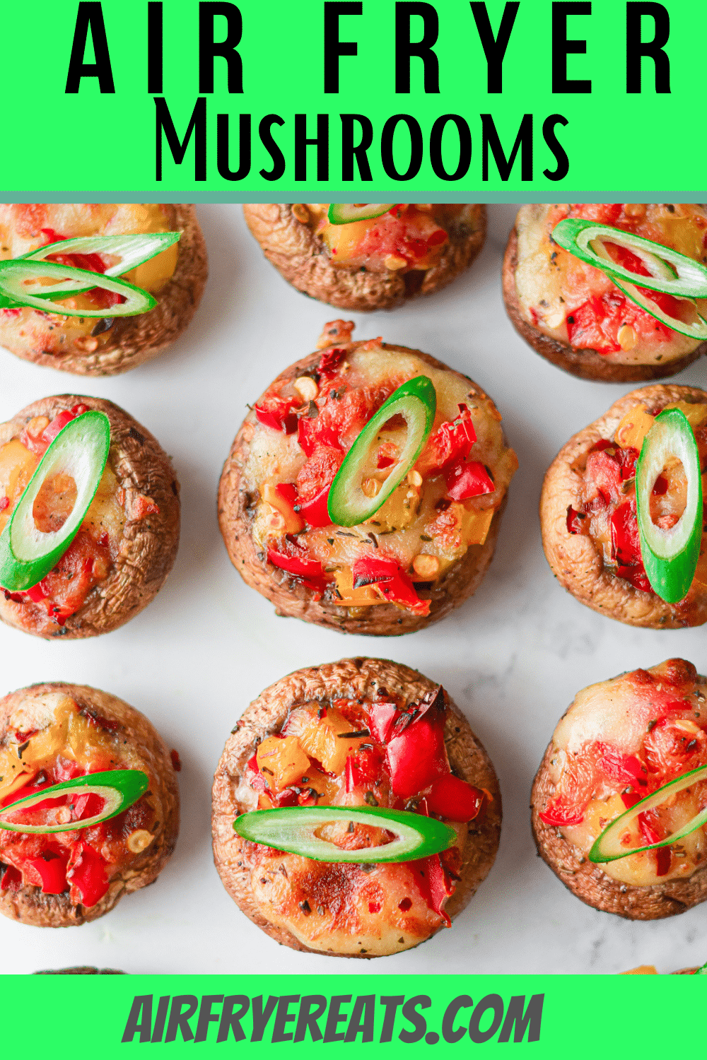 Air Fryer Stuffed Mushrooms are the vegetarian appetizer everyone wants to eat! These yummy stuffed mushroom caps are filled with gooey mozzarella cheese, red and yellow bell peppers, and a delicious Italian seasoning blend. #vegetarianapps #meatlessmonday #stuffedmushrooms via @vegetarianmamma