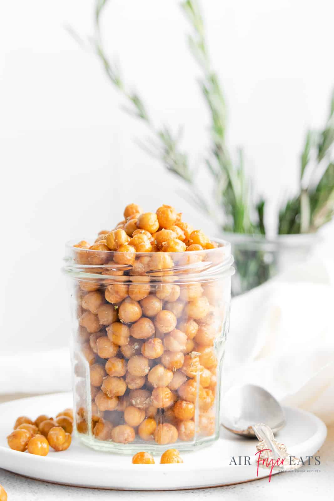 a glass mason jar full of roasted chickpeas