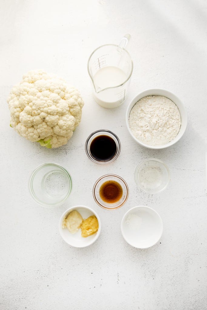 top down view of all of the ingredients for sesame cauliflower, each in separate bowls.