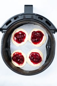 4 cherry danish in an air fryer basket