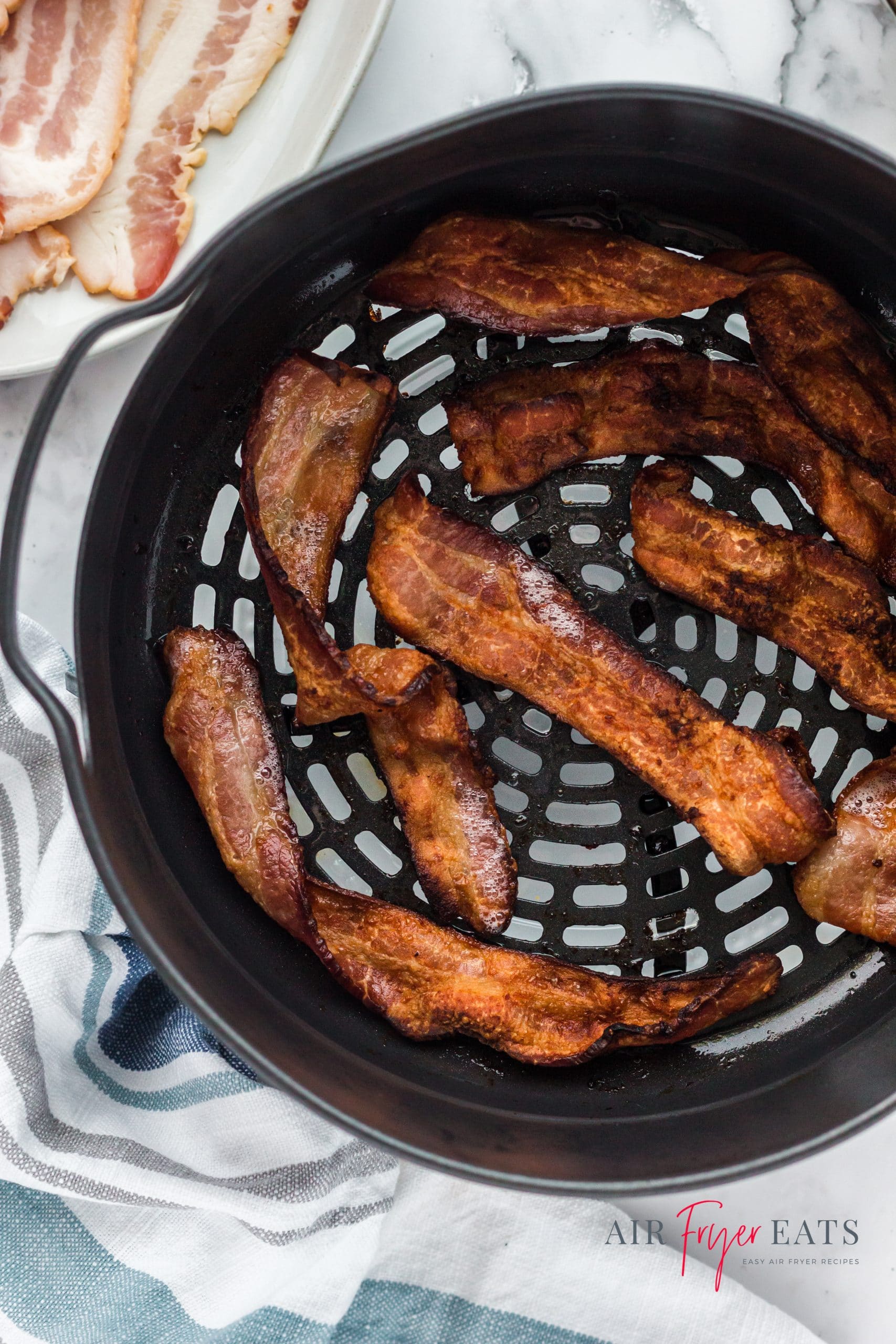 crispy bacon in the ninja foodi air fryer basket