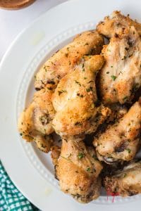 a plate of crispy ninja foodi chicken wings, close up.