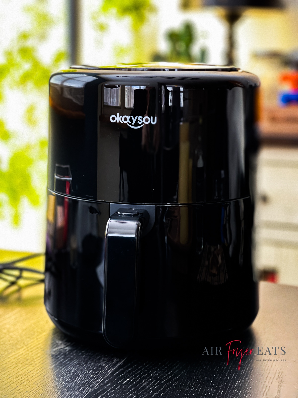 black okaysou air fryer on black table