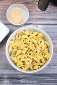 A bowl of boiled tortellini prior to breading