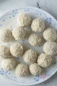Balls after being dipped in breadcrumbs