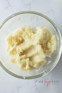 Creamy mashed potato in a glass bowl