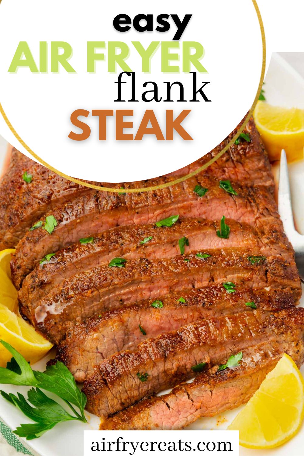 a large air fryer flank steak sliced, on a platter surrounded by lemon wedges. text at top of image says "easy air fryer flank steak" in black, green, and brown letters.