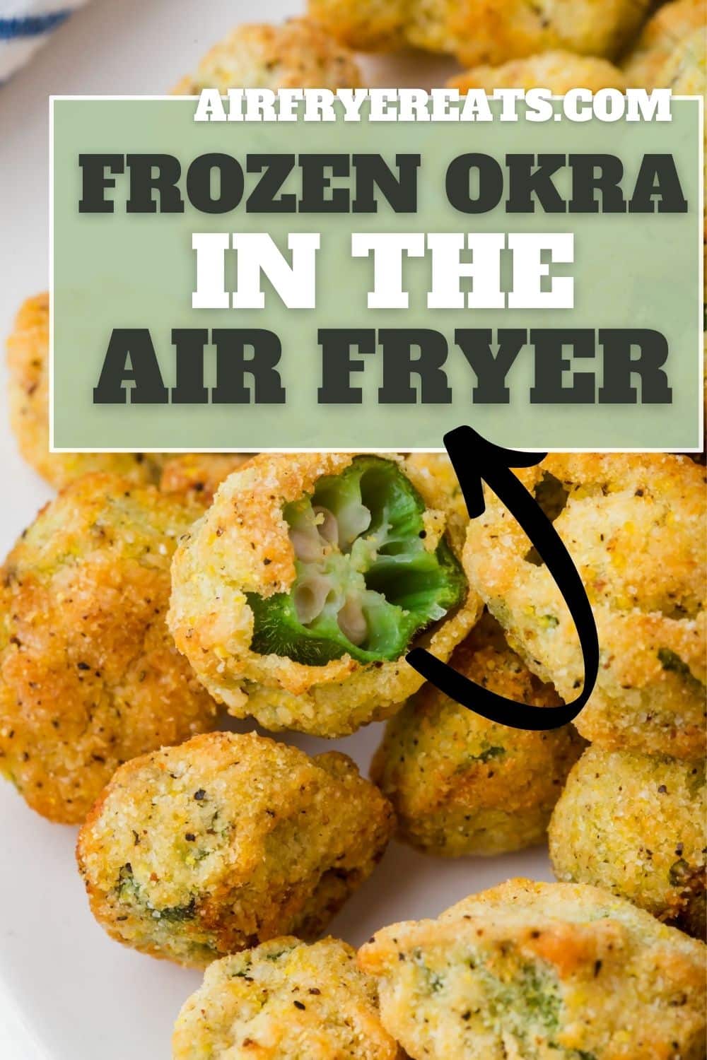 closeup of a plate of air fryer frozen okra. One pice has been bitten to show the interior texture. Green box includes text that says "frozen okra in the air fryer"