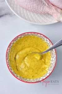 Put mustard, mayo, salt and all spices in a bowl. Stir until you get a smooth marinade