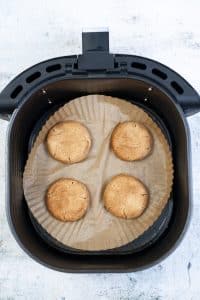 A black basket containing 4 snickerdoodle cookies