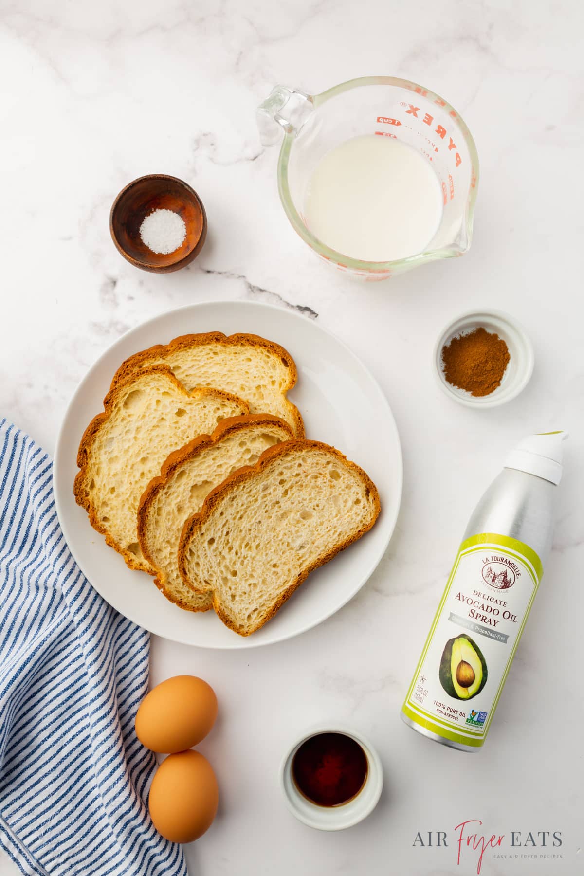 The ingredients needed to make air fryer french toast,