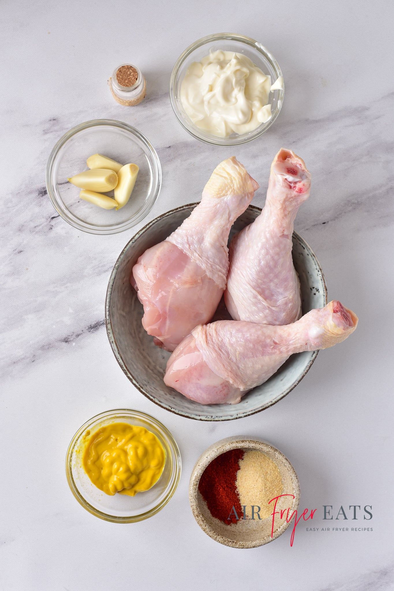the ingredients needed to make air fryer chicken legs with mayo and mustard. 