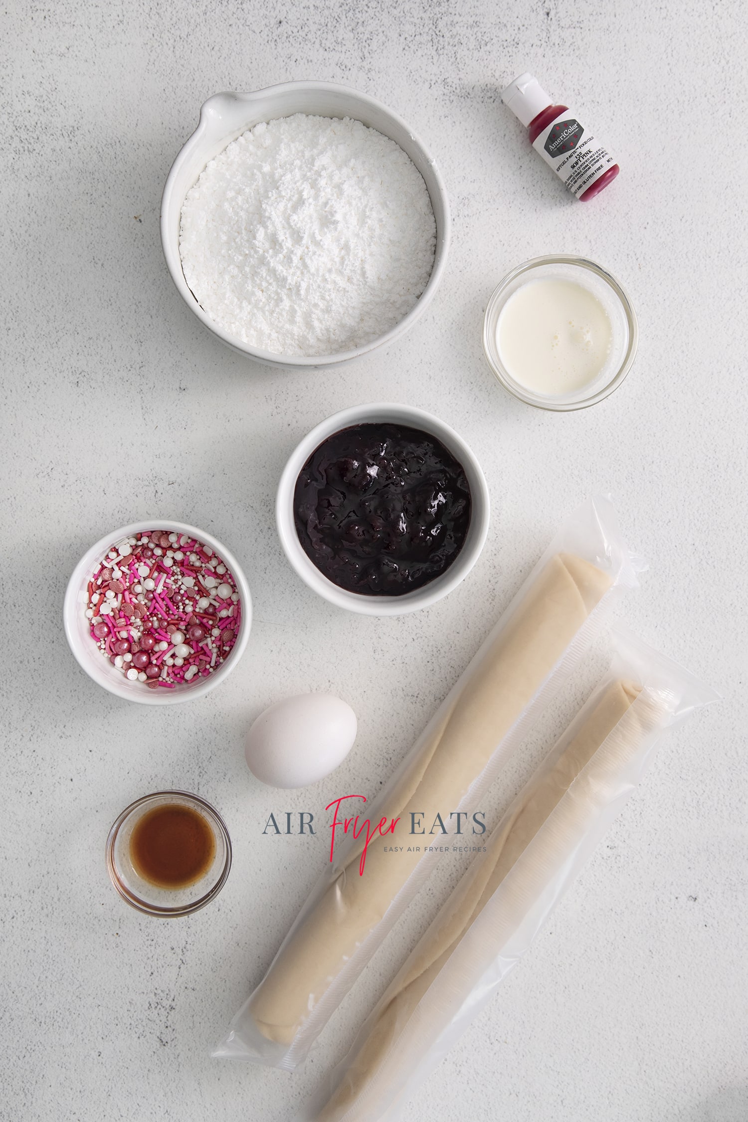 the ingredients needed to make air fryer poptarts from scratch, including pie dough and jam.