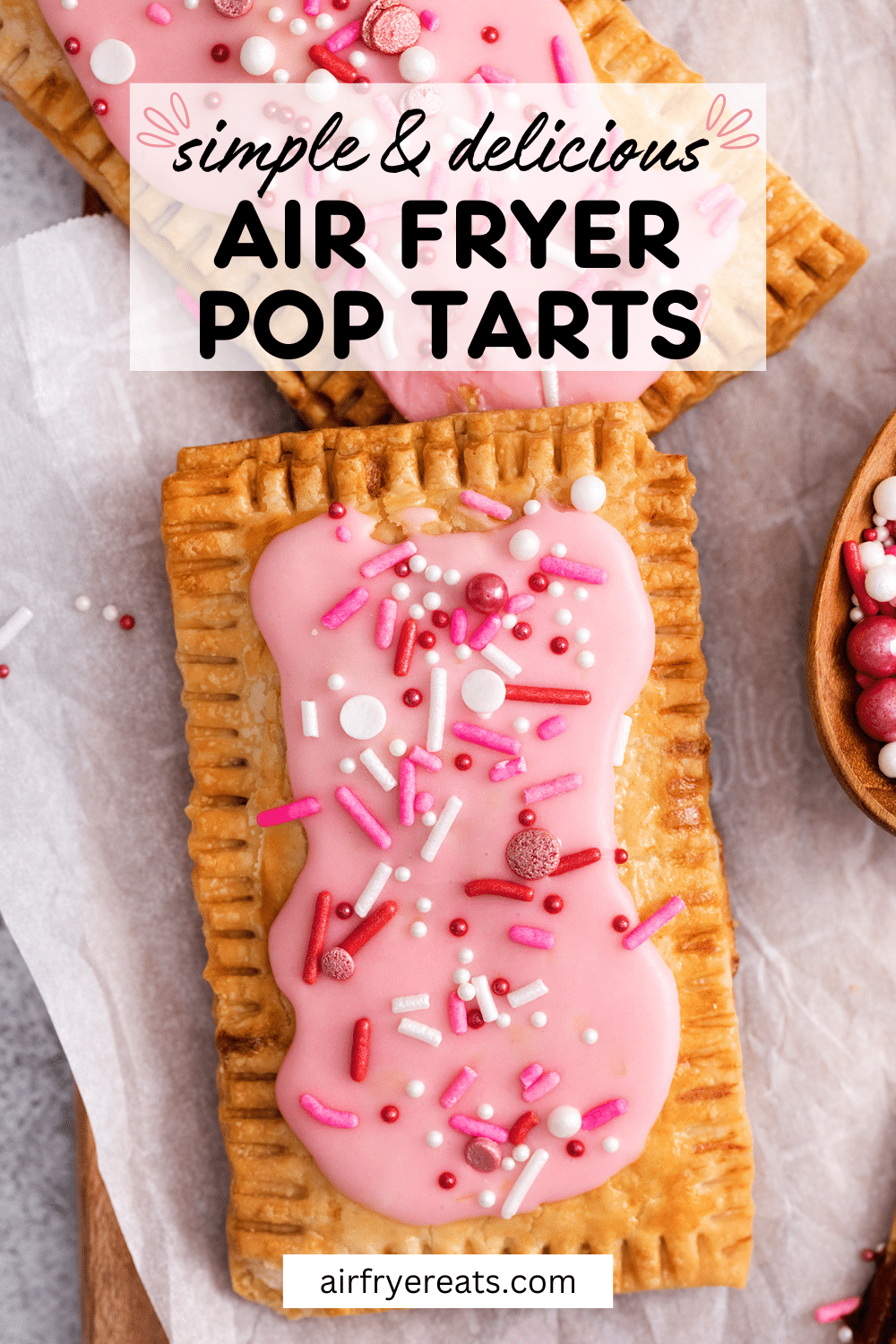 Making Pop Tarts in the Air Fryer, from scratch, is easier than you think! These rectangular fruit filled pastries are topped with pink frosting and sprinkles, just like you remember. But these Air Fryer Pop Tarts are better than the ones from the box, because you made them yourself! via @vegetarianmamma