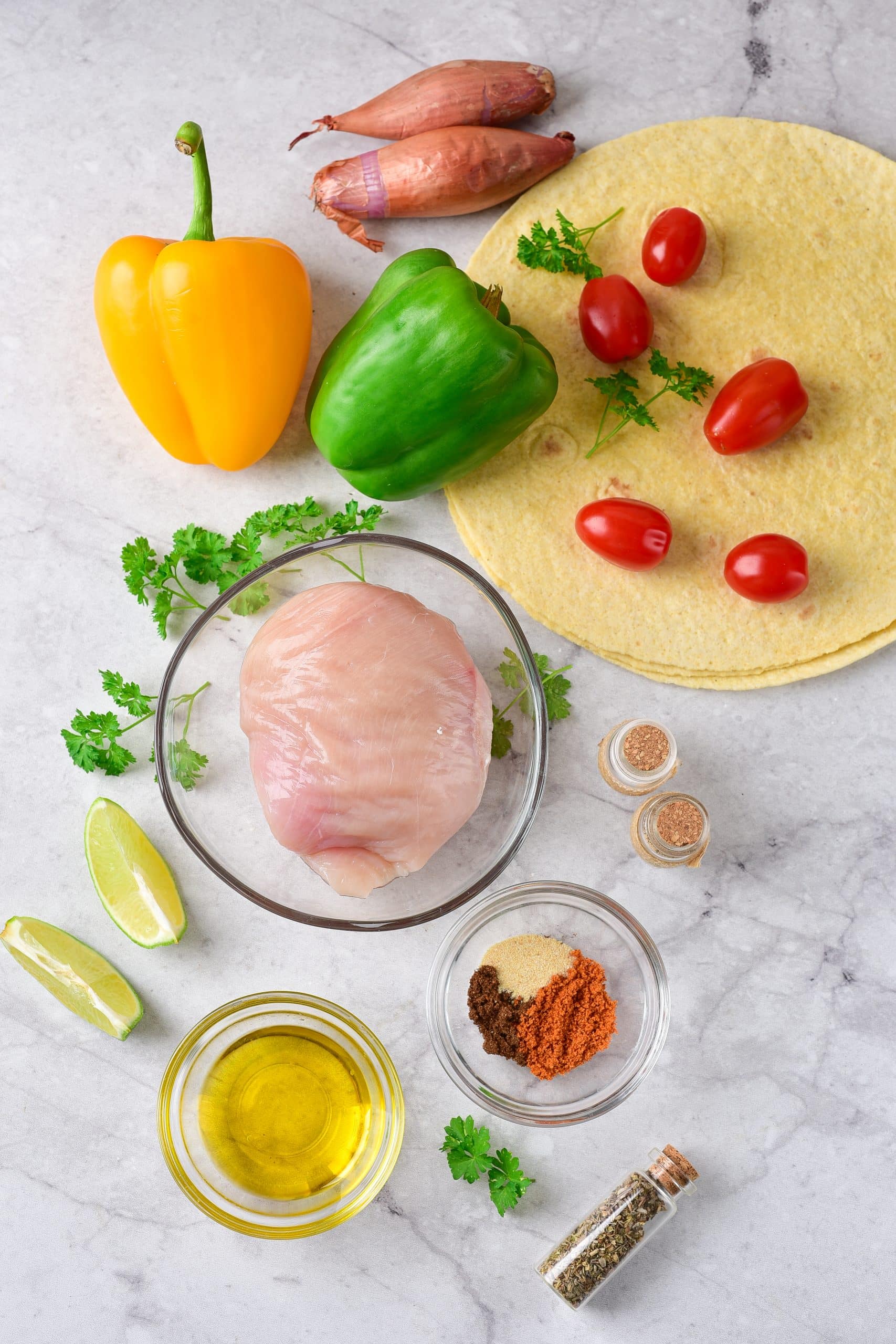 The ingredients needed to make chicken fajitas in the air fryer.