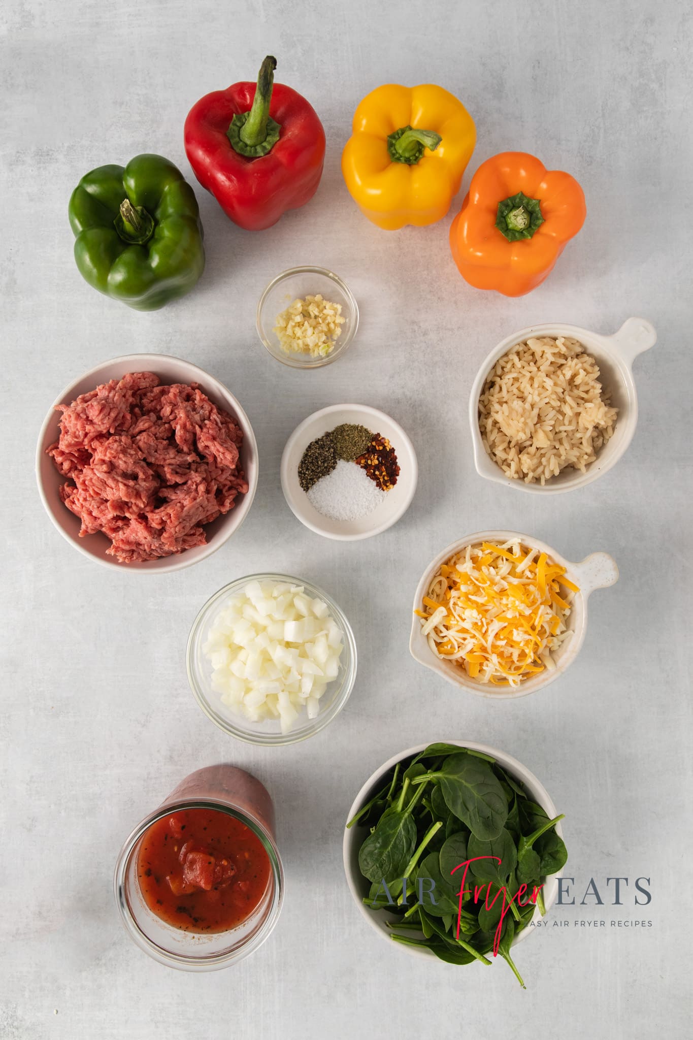 The ingredients needed to make homemade italian style stuffed peppers